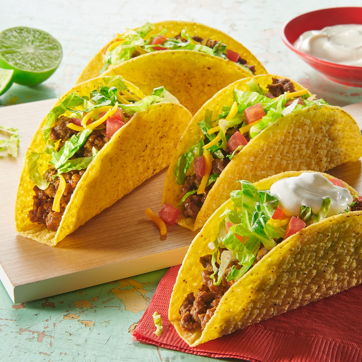 Old El Paso Mild Seasoning dusted onto ground beef enhances tacos in minutes.