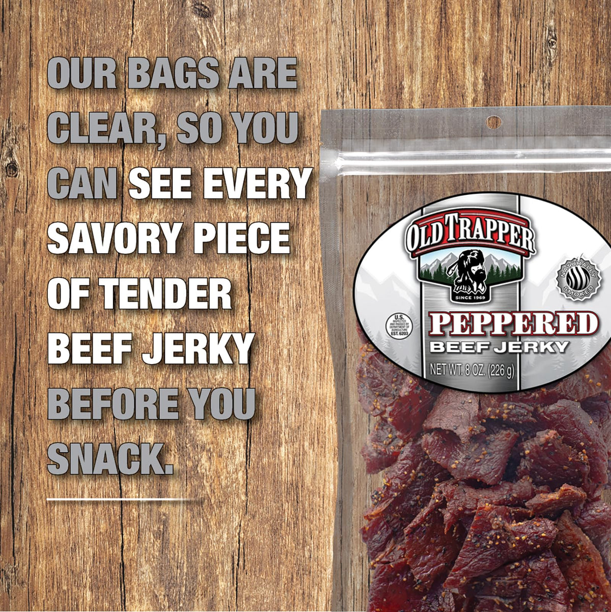 Old Trapper Peppered Jerky close-up shows visible pepper specks and lean texture.