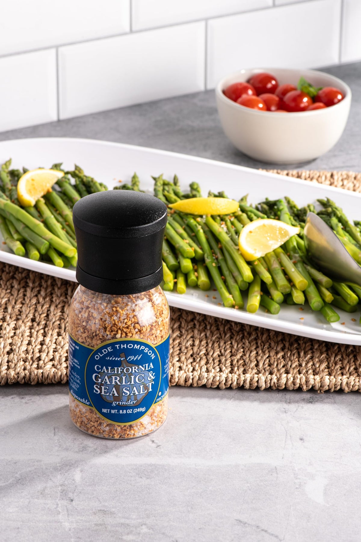 Olde Thompson California Garlic and Sea Salt Grinder pouring to season fish