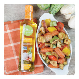 Oleico Gourmet Mediterranean-style safflower oil bottle with garlic flakes ideal for fresh dressings