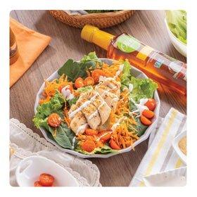 Oleico Gourmet tasting spoon with infused oil highlighting aroma and versatility in cooking