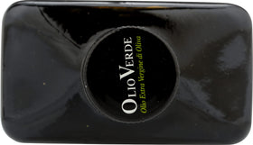 Olio Verde pouring olive oil over pasta or vegetables.