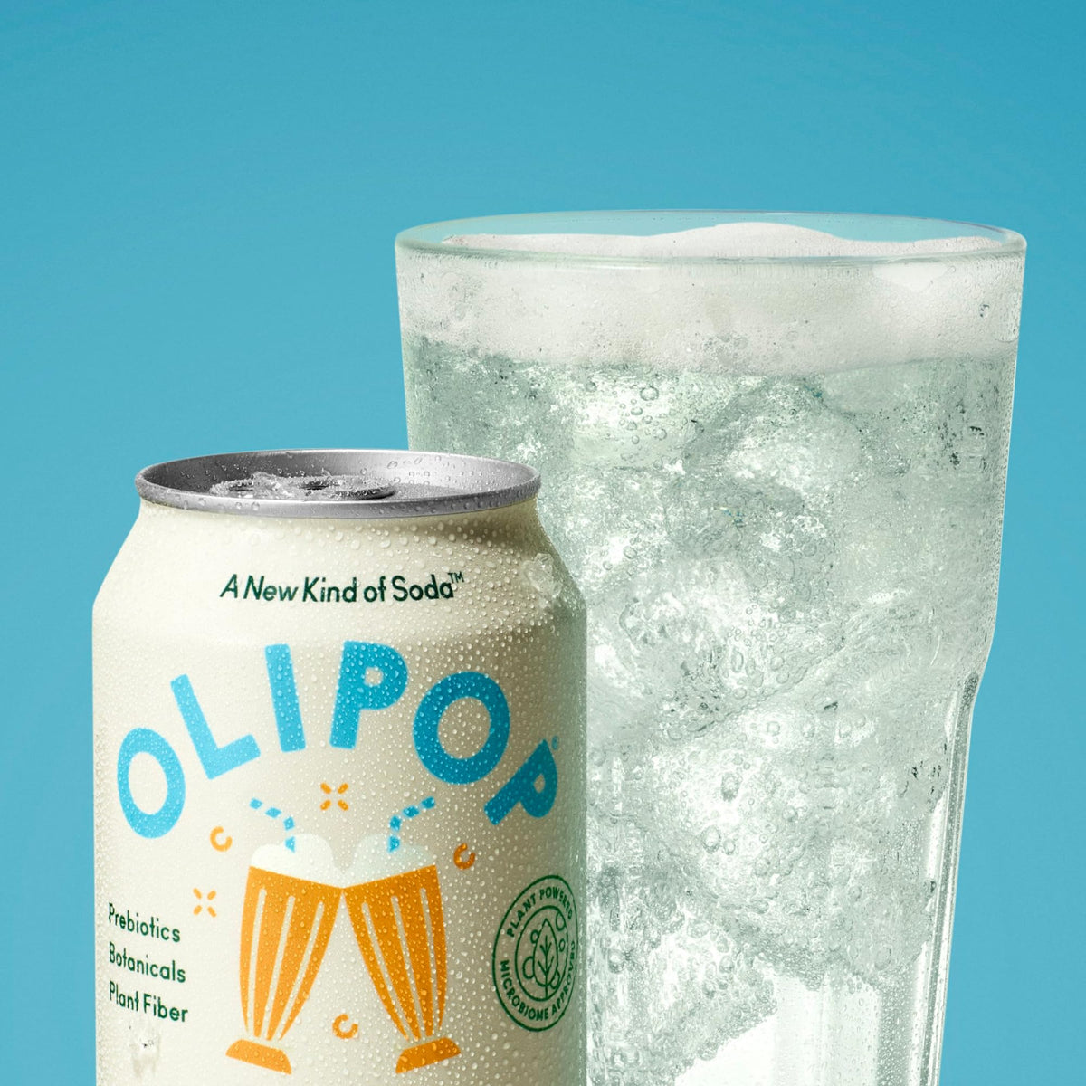 OLIPOP poured into glass; refreshing moment with fiber and botanicals.
