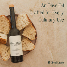 Oliva Dorado golden oil glow on a light surface.