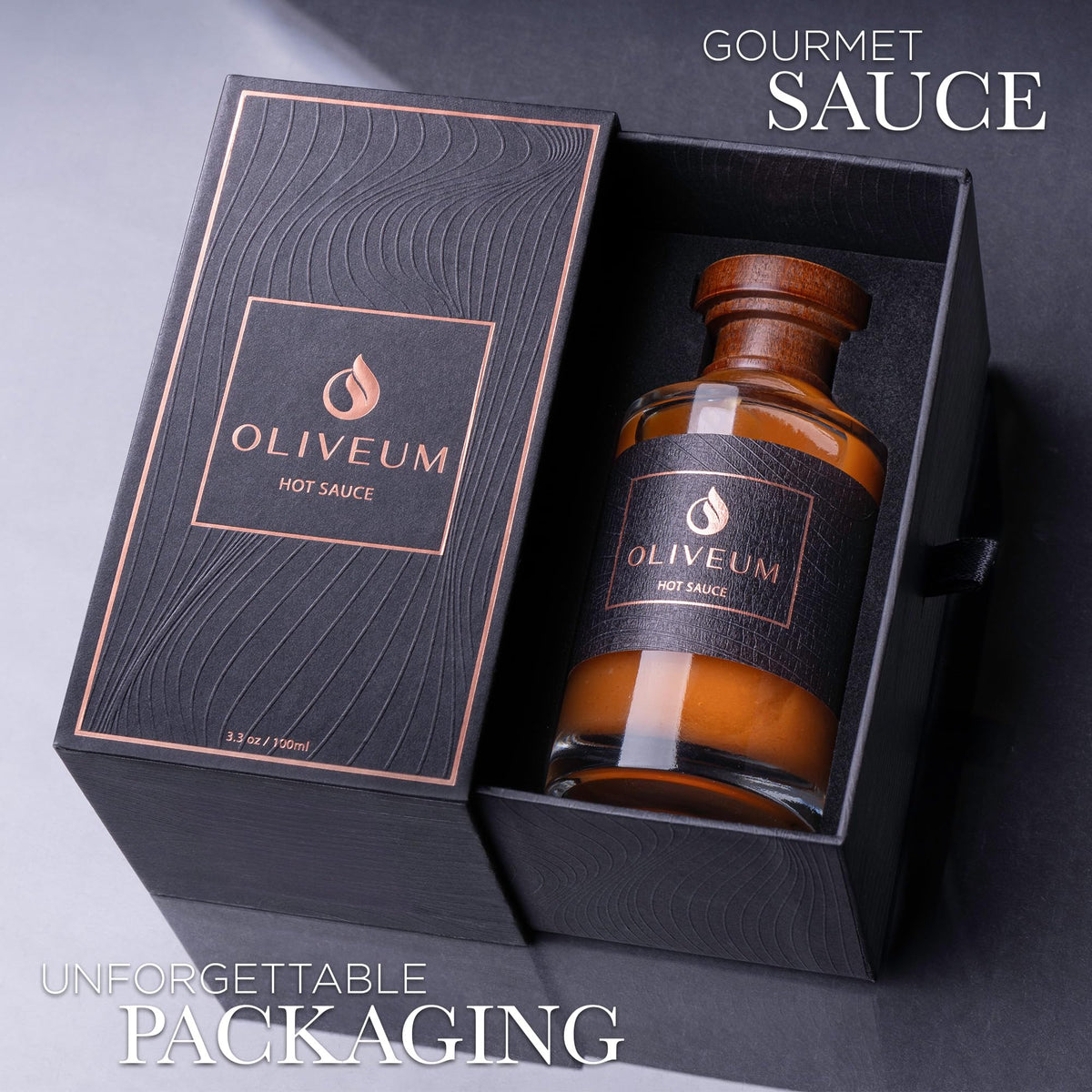 Oliveum hot sauce glass bottle displayed as a gourmet centerpiece.