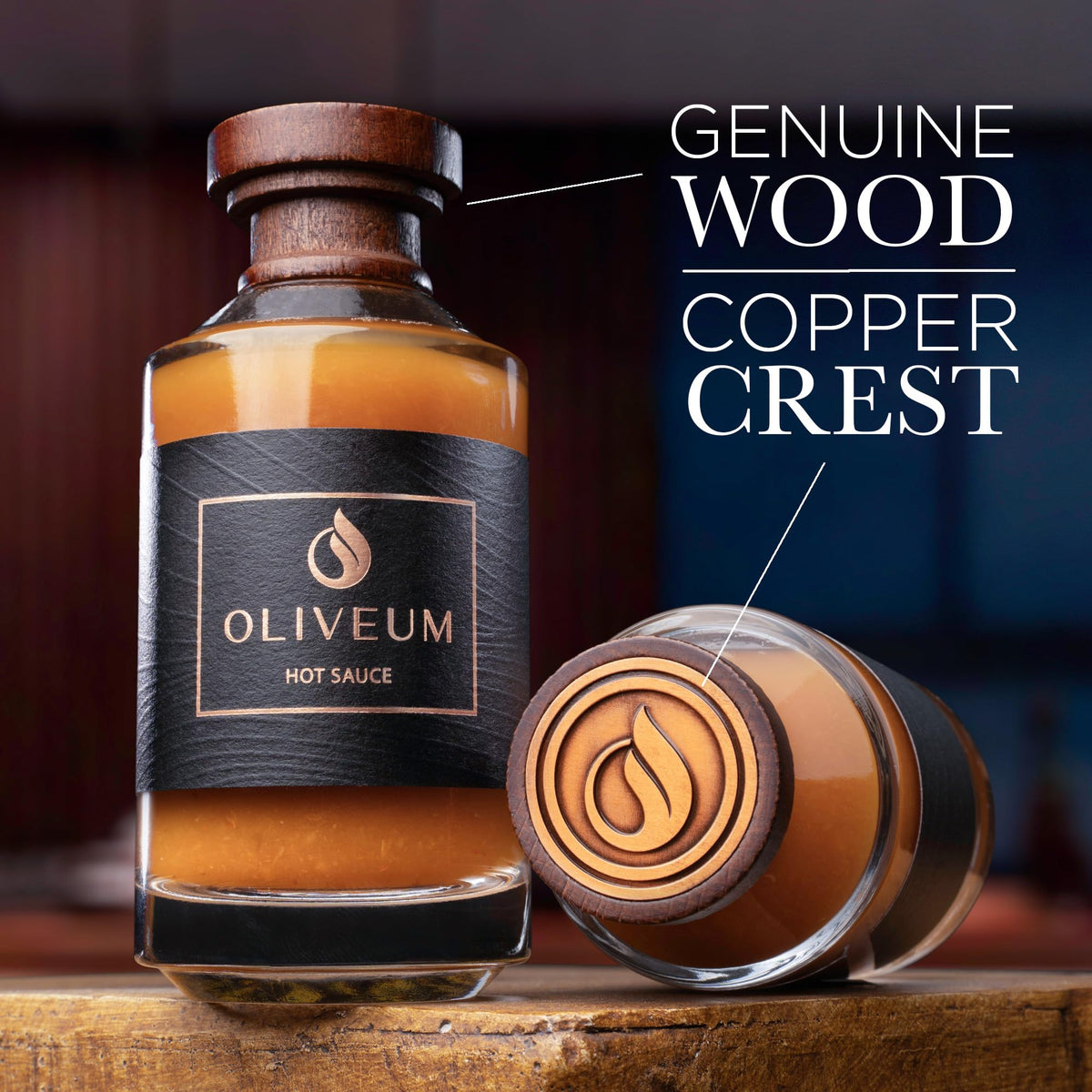 Oliveum hot sauce walnut-cap bottle with copper medallion for kitchen elegance.