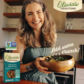 Olivia's Croutons close-up shows garlic-herb seasoning for savory crunch.