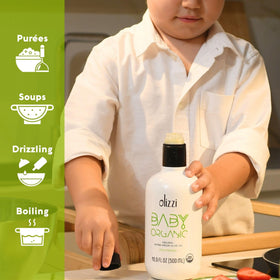 Close up pour of Olizzi olive oil for baby food highlighting clean quality