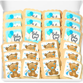 OMCookie baby boy 24-pack cookies displayed for baby shower dessert table