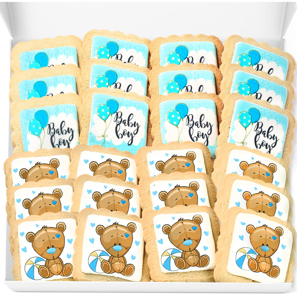 OMCookie baby boy 24-pack cookies displayed for baby shower dessert table