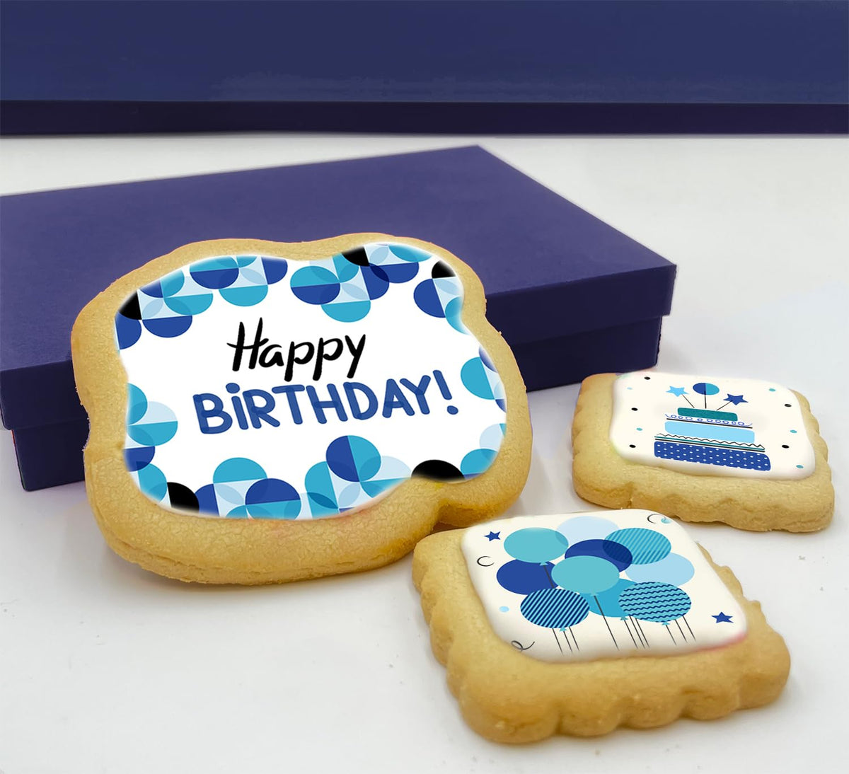 OMCookie blue birthday cookies close-up, decorative sugar cookies for celebrations.
