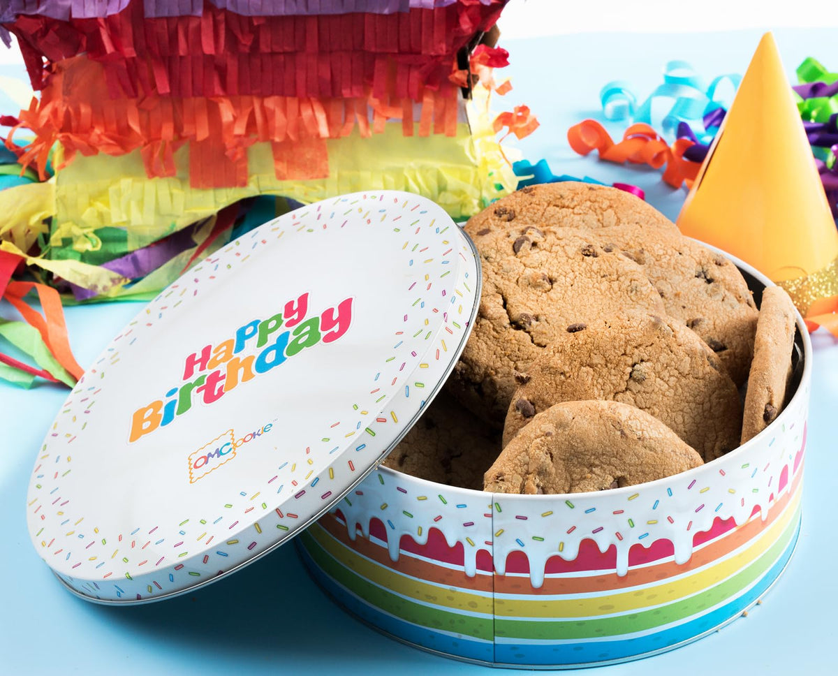 OMCookie Happy Birthday Cookies tin closeup showing large chocolate chip cookies.
