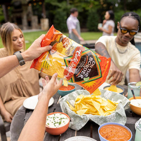 On The Border chips atop loaded nachos for crunch and color.