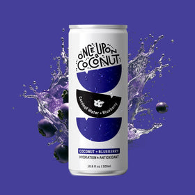 Once Upon A Coconut blueberry coconut water glass ready for on-the-go hydration.