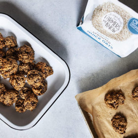 One Degree gluten-free sprouted quick oats in baking bowl for a nutritious recipe.