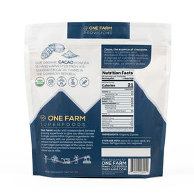 One Farm by WAAYB organic cacao powder close-up highlights single estate sourcing and aroma.