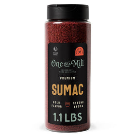 ONE IN A MILL sumac jar pour showing tangy aroma for shawarma and marinades