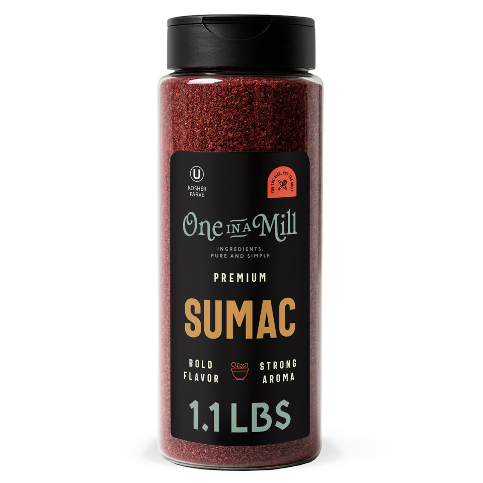 ONE IN A MILL sumac jar pour showing tangy aroma for shawarma and marinades