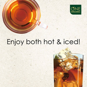 Pouring prepared iced tea from One Organic Instant Oolong Tea Powder.