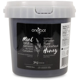 OneRoot raw buckwheat honey glass jar shows rich amber color
