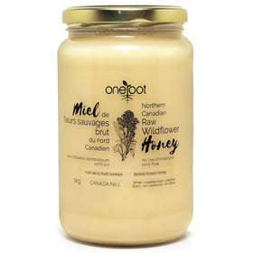 OneRoot wildflower honey bottle pouring, rich flavor for everyday sweetness.