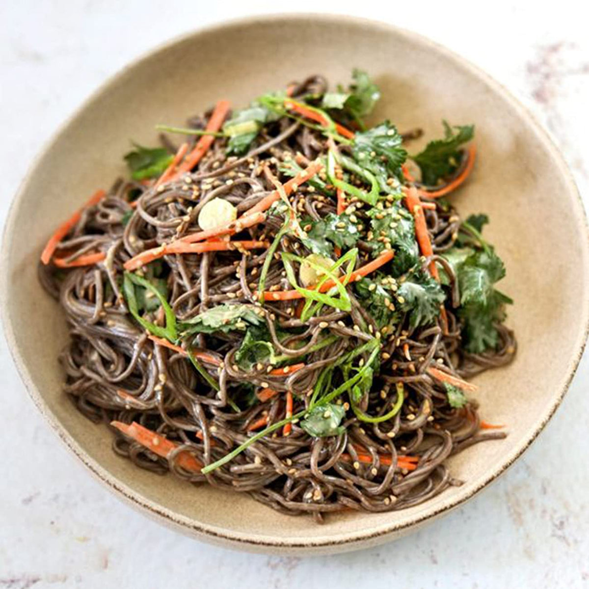 ONETANG gluten-free buckwheat spaghetti served in a colorful plate, ready for sauce.