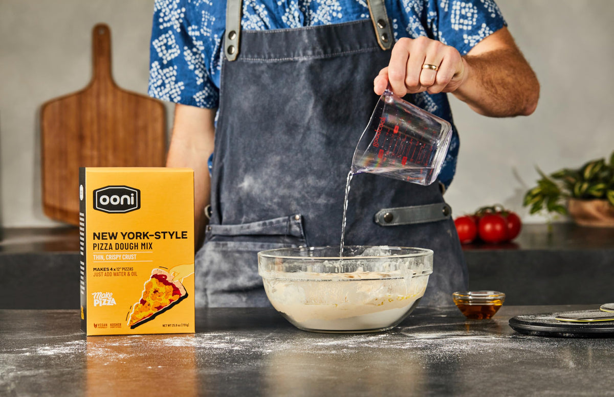 Four 12-inch pizza dough balls ready to roll from Ooni mix