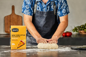 Dough shaping close-up with Ooni New York Style dough