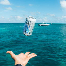 Open Water pour shot emphasizing clean, balanced taste.