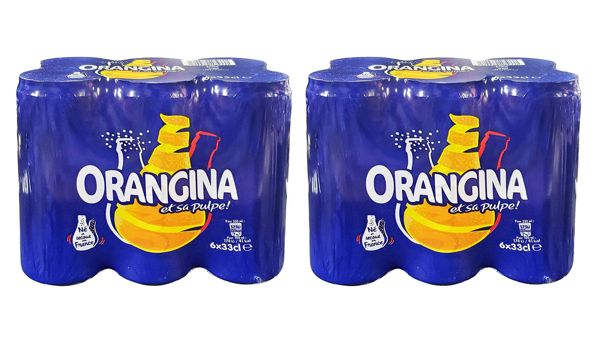 Orangina Pulpe poured into a glass showing vibrant orange hue and pulp
