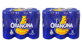 Orangina Pulpe poured into a glass showing vibrant orange hue and pulp