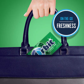 Close-up of individual Orbit Spearmint gum pack offers quick refreshment.
