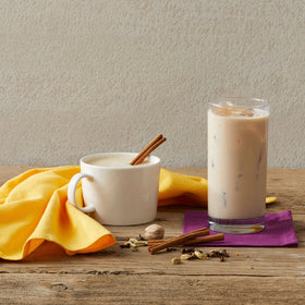 Close-up of vanilla, cardamom, clove, and cinnamon.