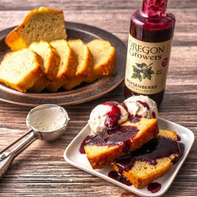 Oregon Growers Boysenberry Syrup label close-up highlighting local sourcing and non-GMO promise.