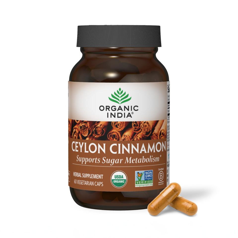 ORGANIC INDIA Ceylon Cinnamon bottle pour highlighting warm spice aroma for digestion support