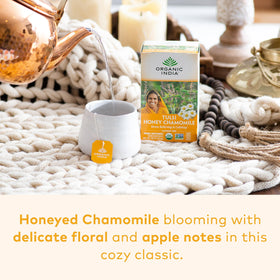 Organic India Tulsi Honey Chamomile cup releasing calming aroma after steeping.