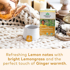 Organic India Tulsi Lemon Ginger tea bags steeping in a cup for comfort
