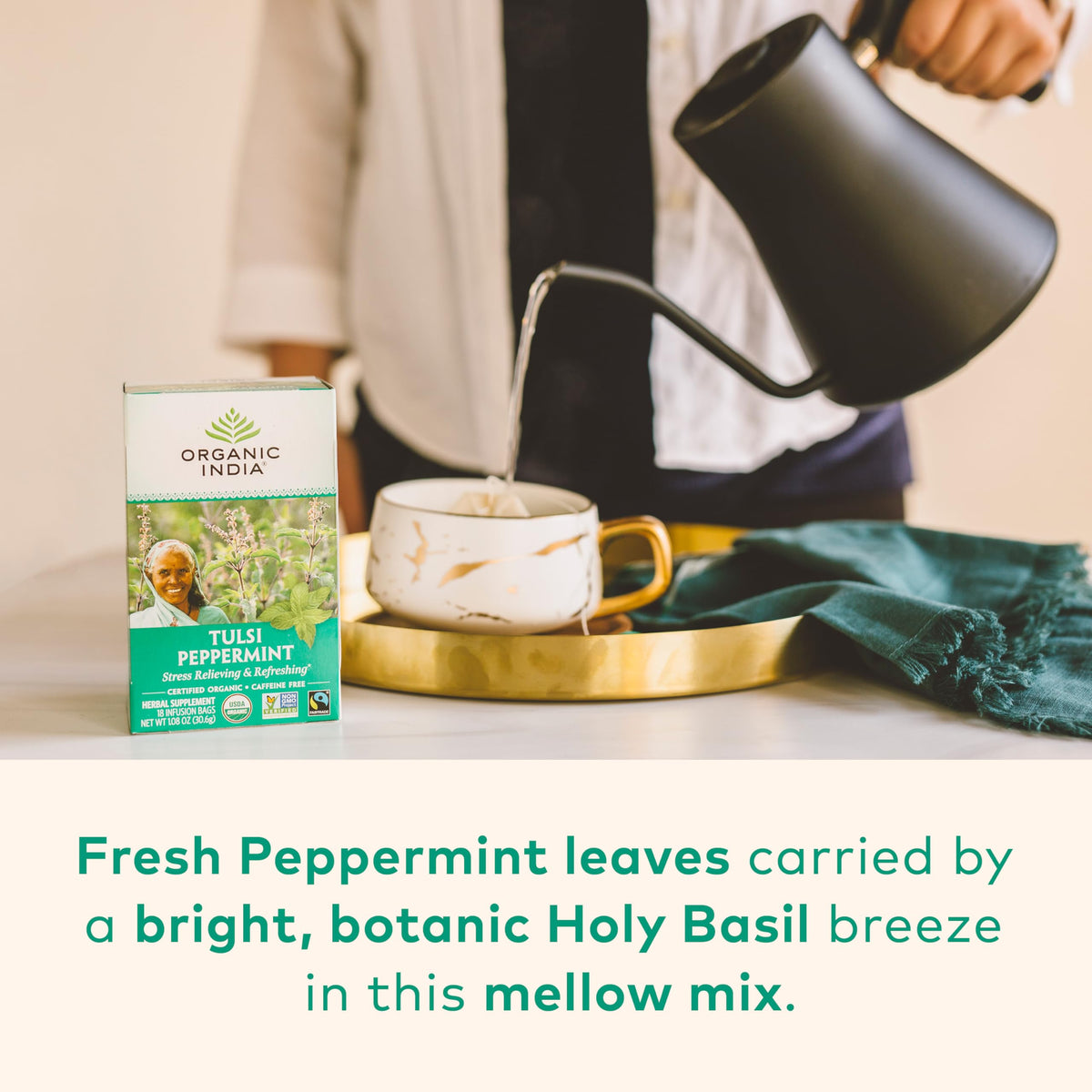 Cup for steeping ORGANIC INDIA Tulsi Peppermint Tea releasing refreshing aroma