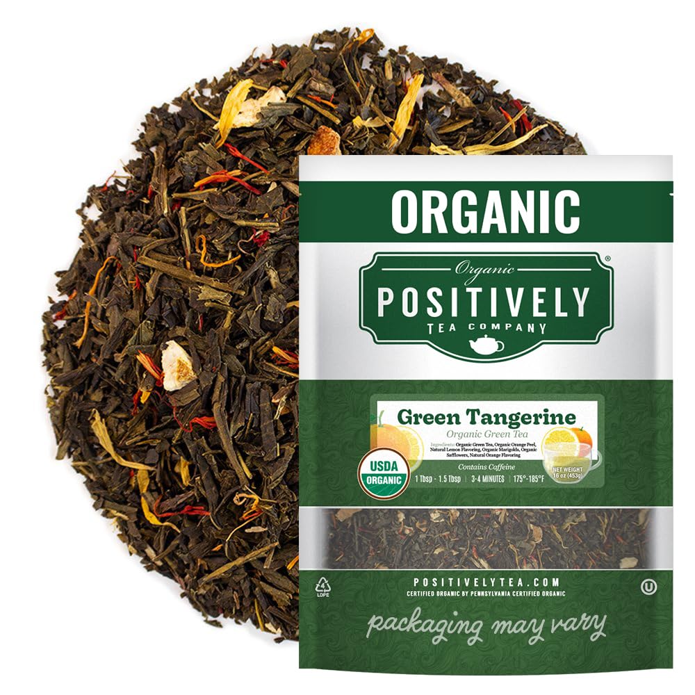 Organic Positively Green Tangerine loose-leaf tea in a cup with bright citrus aroma.