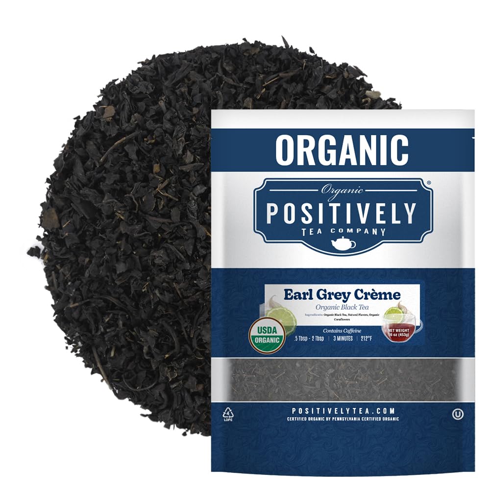 Organic Positively Tea Co Earl Grey Creme loose leaf tea in tin, aromatic bergamot ready for brewing.