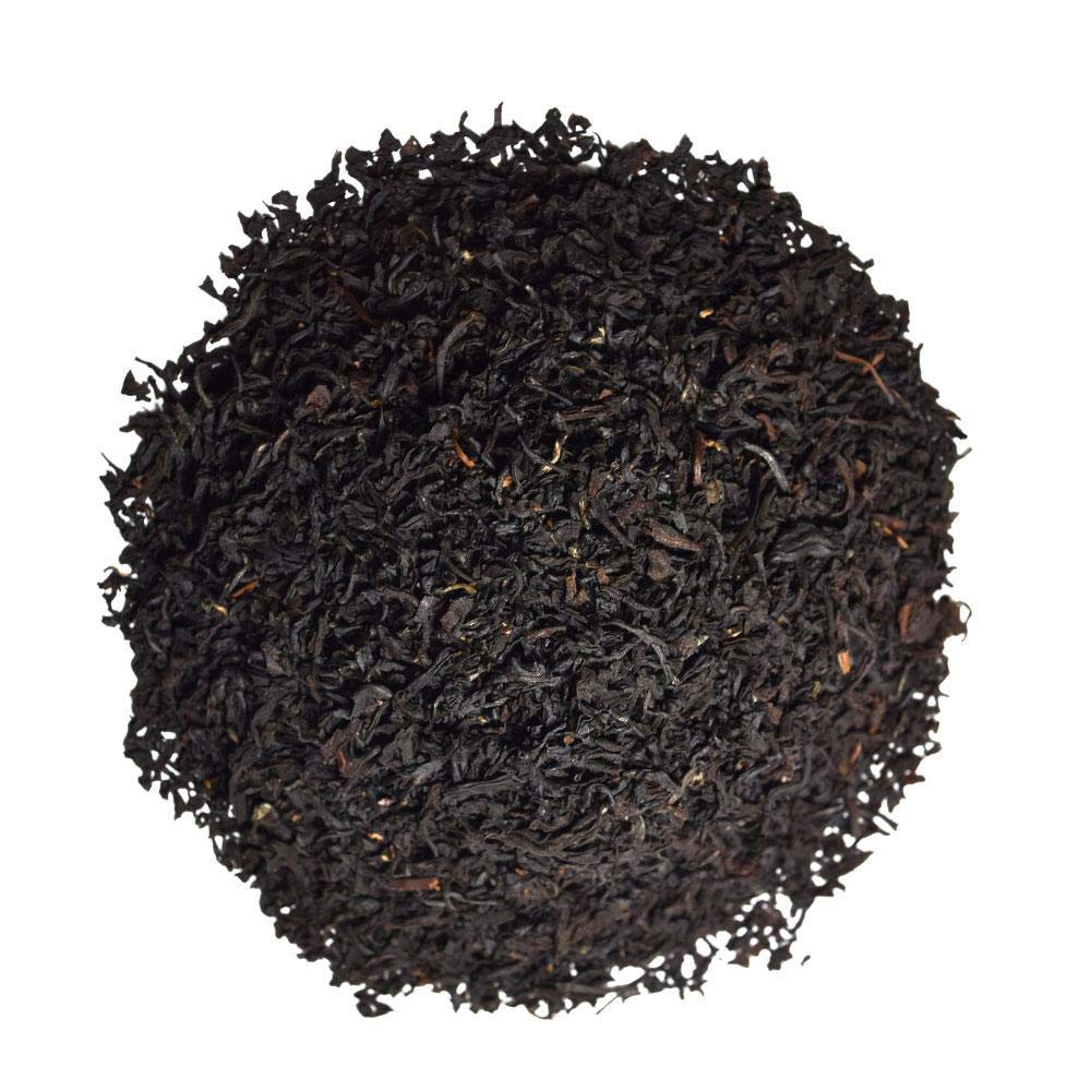 Organic Positively Tea Company hot brew served with cream emphasizes comforting flavor.