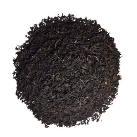Organic Positively Tea Company hot brew served with cream emphasizes comforting flavor.