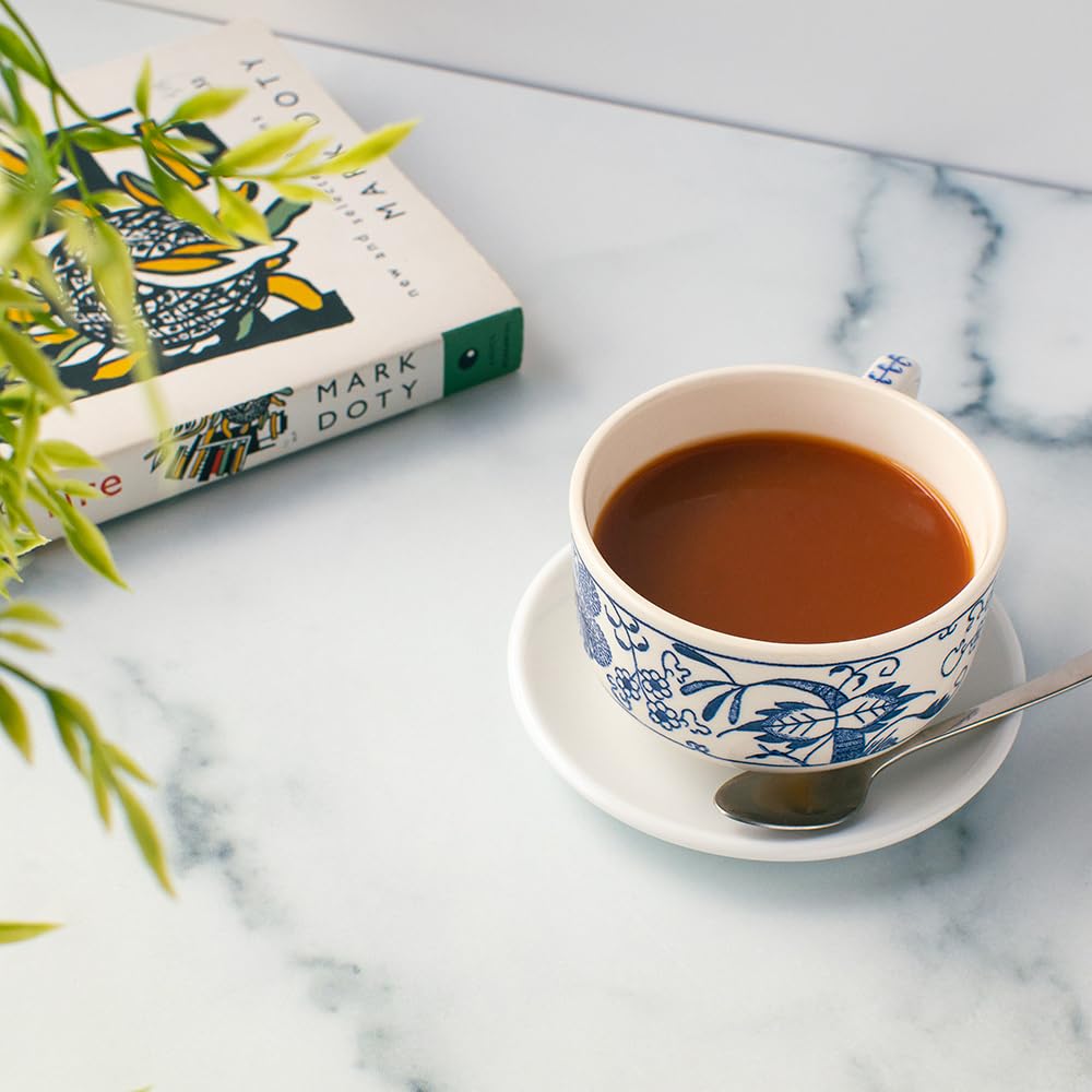 Desk-ready setup with Organic Positively Tea Company decaf English Breakfast on display.