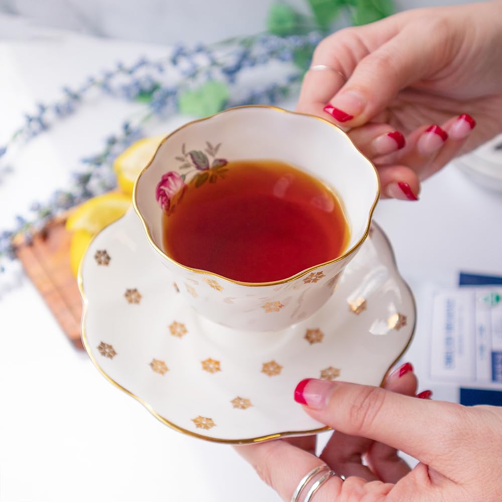 Organic Positively Tea Company English Breakfast infusion shows a warm red-gold hue.