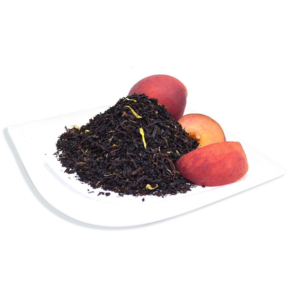 Brewed Juicy Peach Black Tea cup with marigold petals from Organic Positively Tea Company.