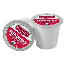 Organic Positively Tea hibiscus pod closeup reveals vibrant red infusion, ideal for iced tea