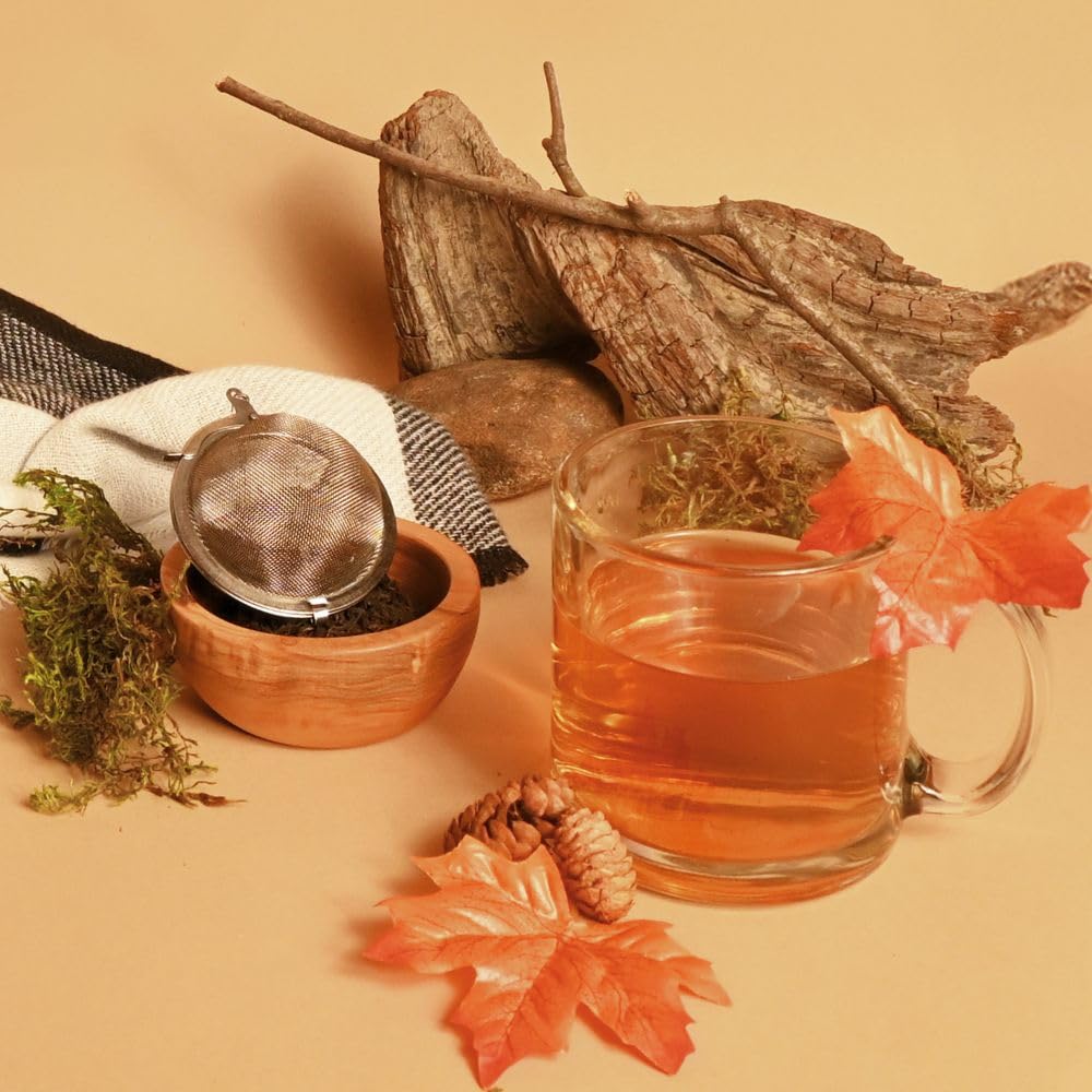 Dry leaves of Organic Positively Tea Company Lapsang Souchong show bold character