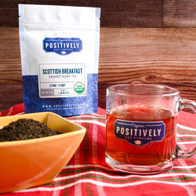 Organic Positively Tea Company Scottish Breakfast kettle-ready setup evoking a cozy morning ritual.