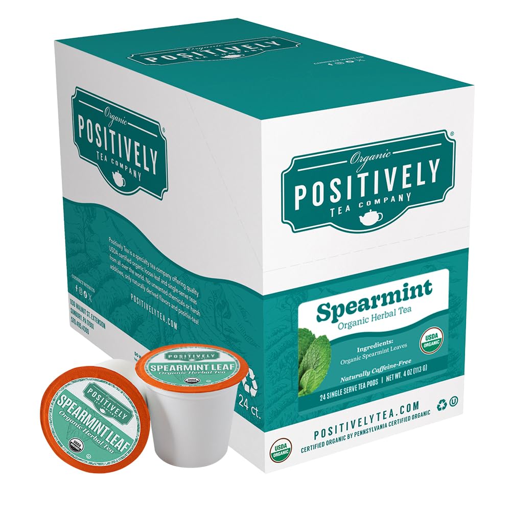 Organic Positively Tea spearmint pods close-up, fresh herb aroma.