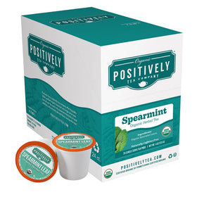 Organic Positively Tea spearmint pods close-up, fresh herb aroma.